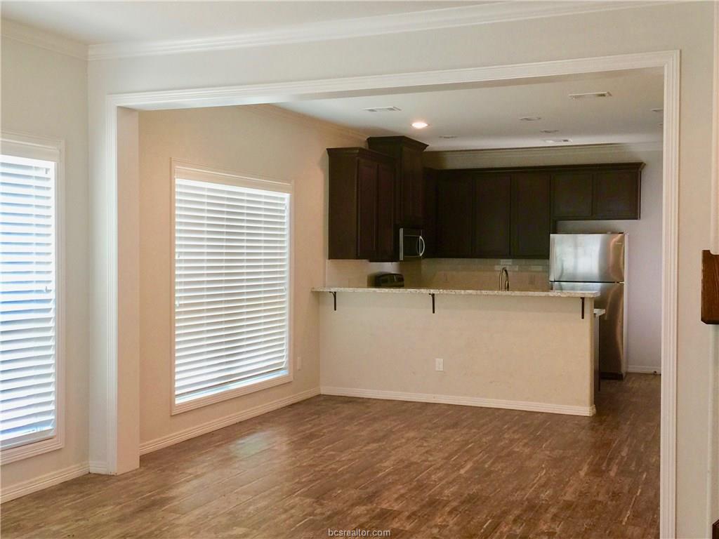 109 Ehlinger Drive Bryan, TX 77801 - Photo 23 of 25 a view of a kitchen with a sink