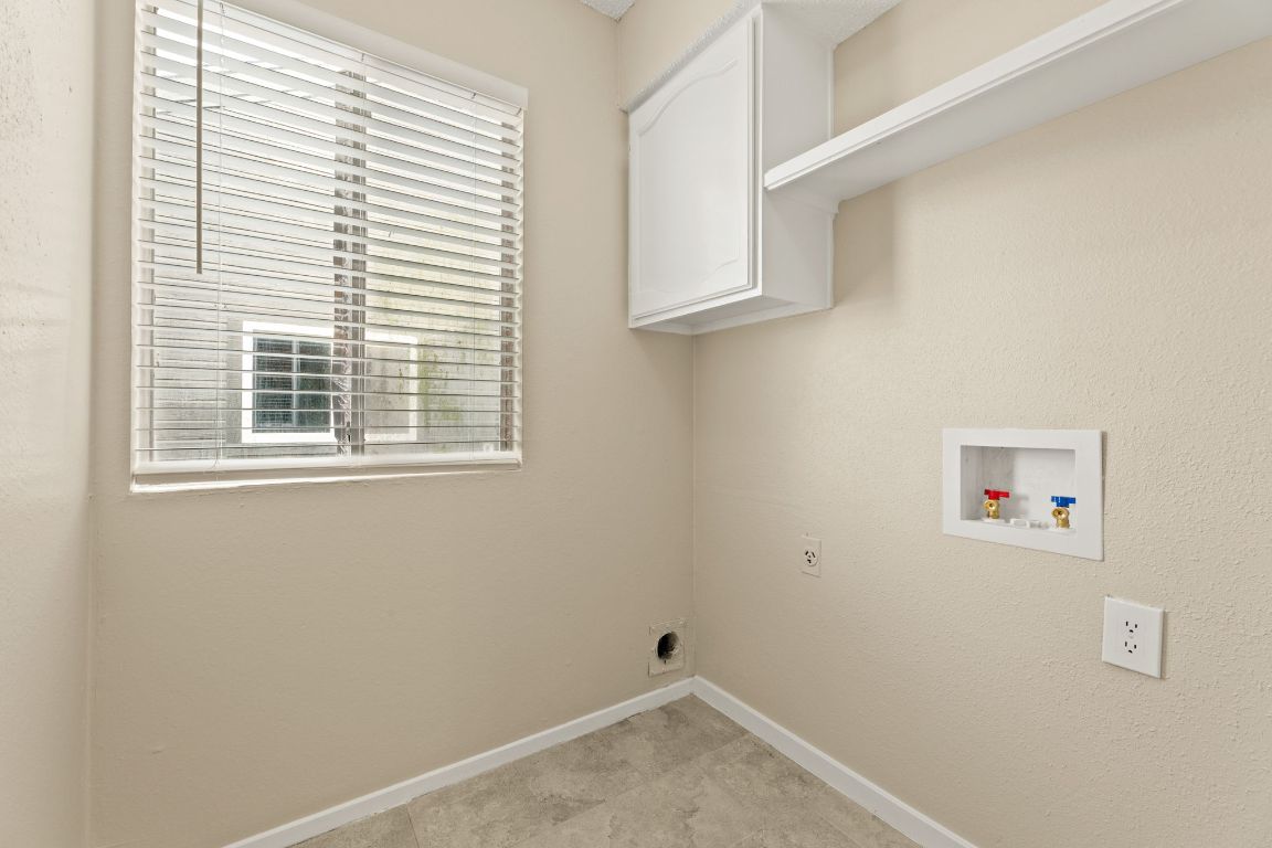 6901 Woodhue Drive, Unit A Austin, TX 78745 - Photo 22 of 34 a view of a room that has a window in it