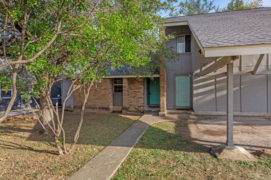 6901 Woodhue Drive, Unit A Austin, TX 78745 - Photo 4 of 34 a view of a house with backyard