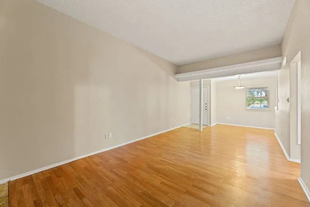a view of an empty room and window