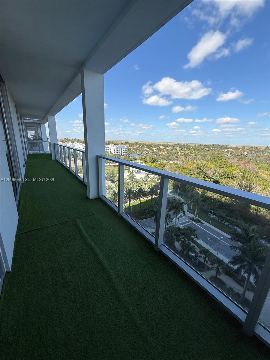 2000 Metropica Way, Unit 901 Sunrise, FL 33323 - Photo 14 of 25 a view of a balcony with an ocean