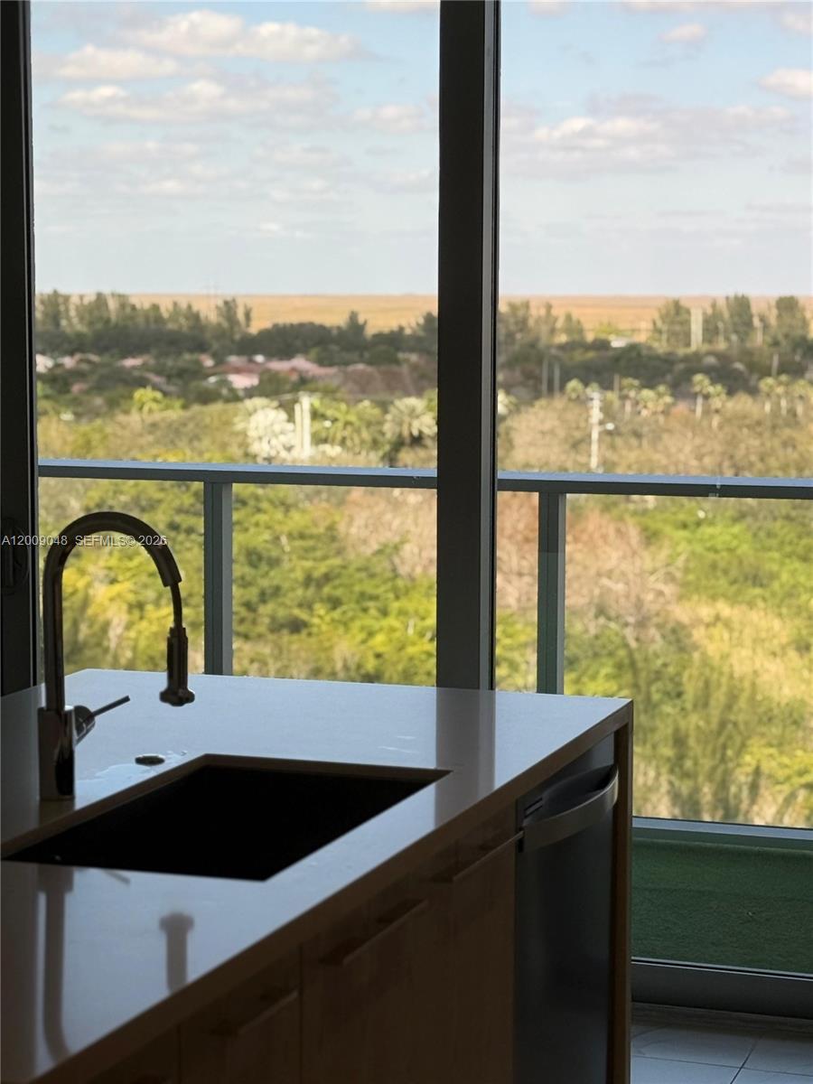 2000 Metropica Way, Unit 901 Sunrise, FL 33323 - Photo 2 of 25 a view of a city from a balcony