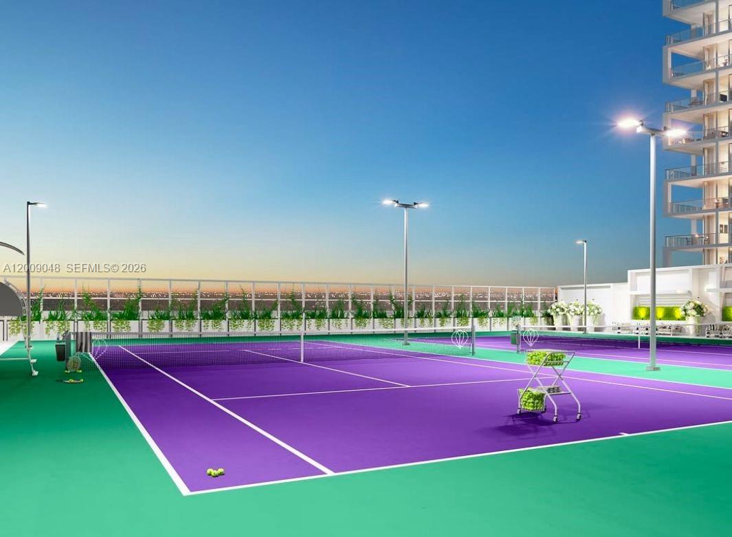 2000 Metropica Way, Unit 901 Sunrise, FL 33323 - Photo 23 of 25 a view of a tennis court