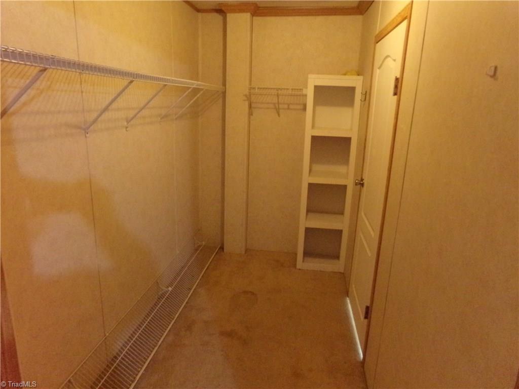 602 Booker T Womble Road Randleman, NC 27317 - Photo 12 of 26 Master bedroom walk in closet