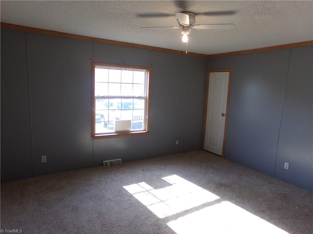 602 Booker T Womble Road Randleman, NC 27317 - Photo 15 of 26 HUGE 3rd bedroom with walk in closet