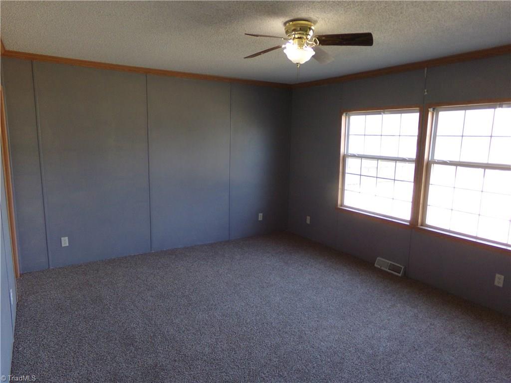 602 Booker T Womble Road Randleman, NC 27317 - Photo 17 of 26 Large 2nd bedroom with walk in closet