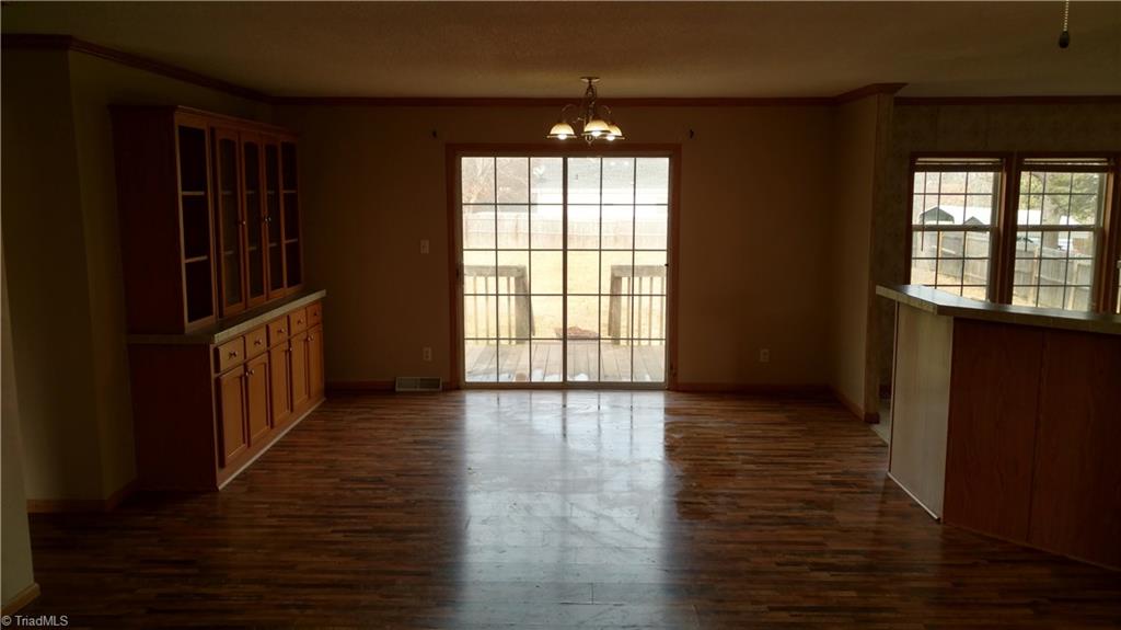 602 Booker T Womble Road Randleman, NC 27317 - Photo 22 of 26 Dining Room with Sliding Patio Door