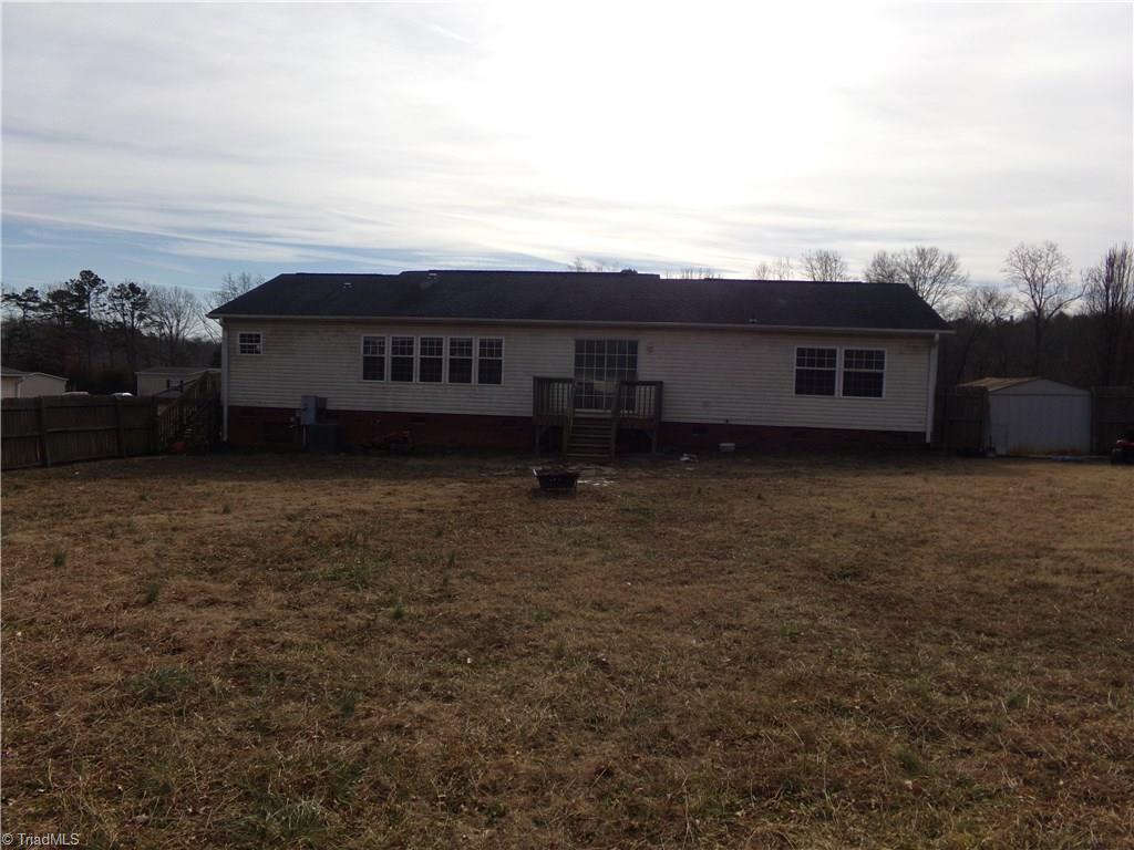 602 Booker T Womble Road Randleman, NC 27317 - Photo 5 of 26 View of back deck and large back yard
