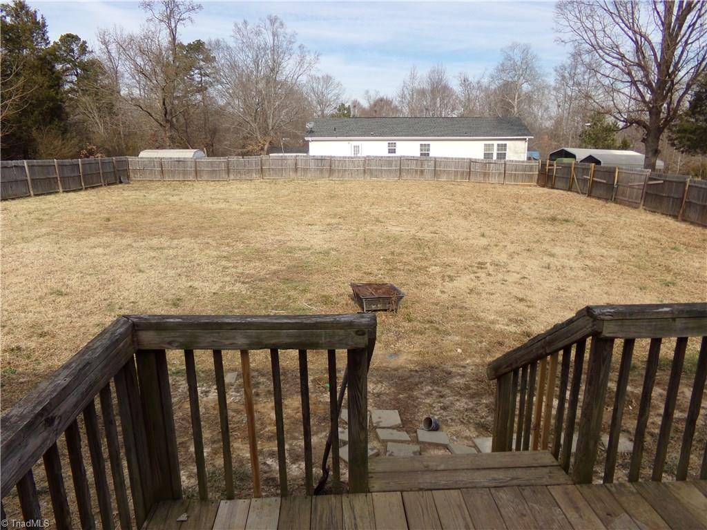 602 Booker T Womble Road Randleman, NC 27317 - Photo 6 of 26 View of large fenced in back yard