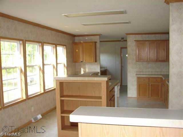 602 Booker T Womble Road Randleman, NC 27317 - Photo 7 of 26 Center Island in Kitchen