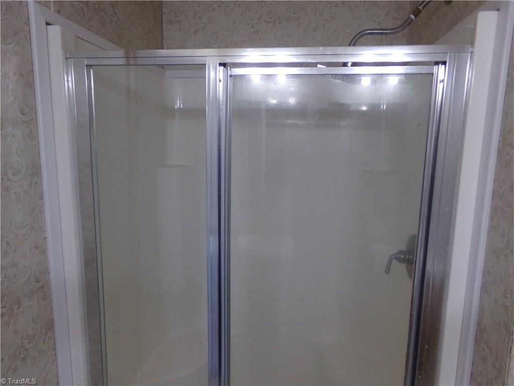 602 Booker T Womble Road Randleman, NC 27317 - Photo 9 of 26 Walk in shower in Master bath