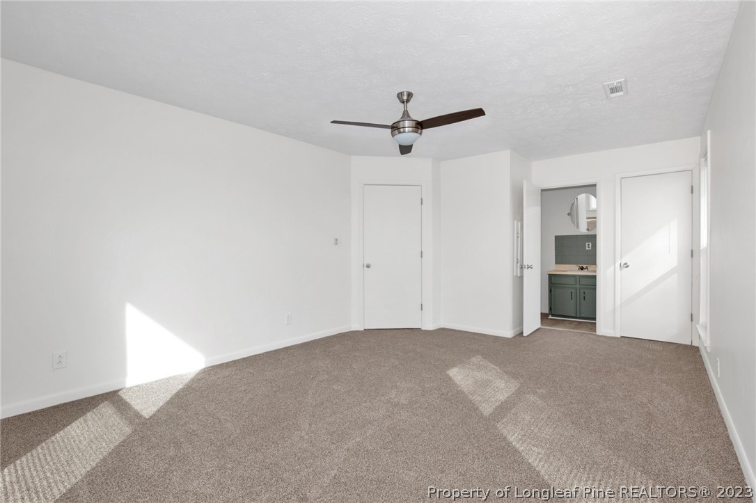 997 Balfour Road Red Springs, NC 28377 - Photo 11 of 15 a view of a big room with carpet