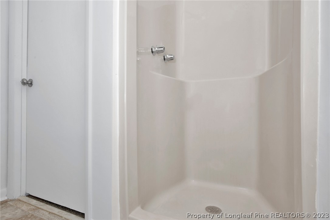 997 Balfour Road Red Springs, NC 28377 - Photo 13 of 15 a bathroom with a shower