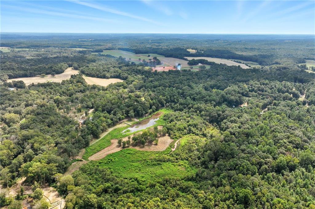 731 Borders Road Commerce, GA 30530 - Photo 22 of 75 an aerial view of a house with a yard