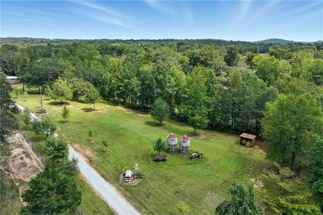 a balcony with furniture and wooden floor