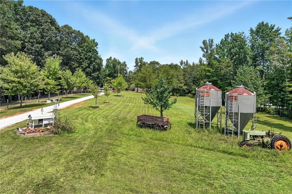 731 Borders Road Commerce, GA 30530 - Photo 25 of 75 an outdoor sitting area with golf course