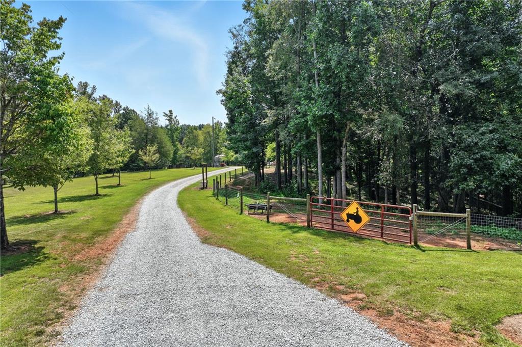 731 Borders Road Commerce, GA 30530 - Photo 32 of 75 a view of a park with swings