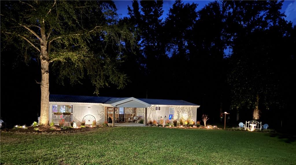 731 Borders Road Commerce, GA 30530 - Photo 48 of 75 a front view of a house with a yard