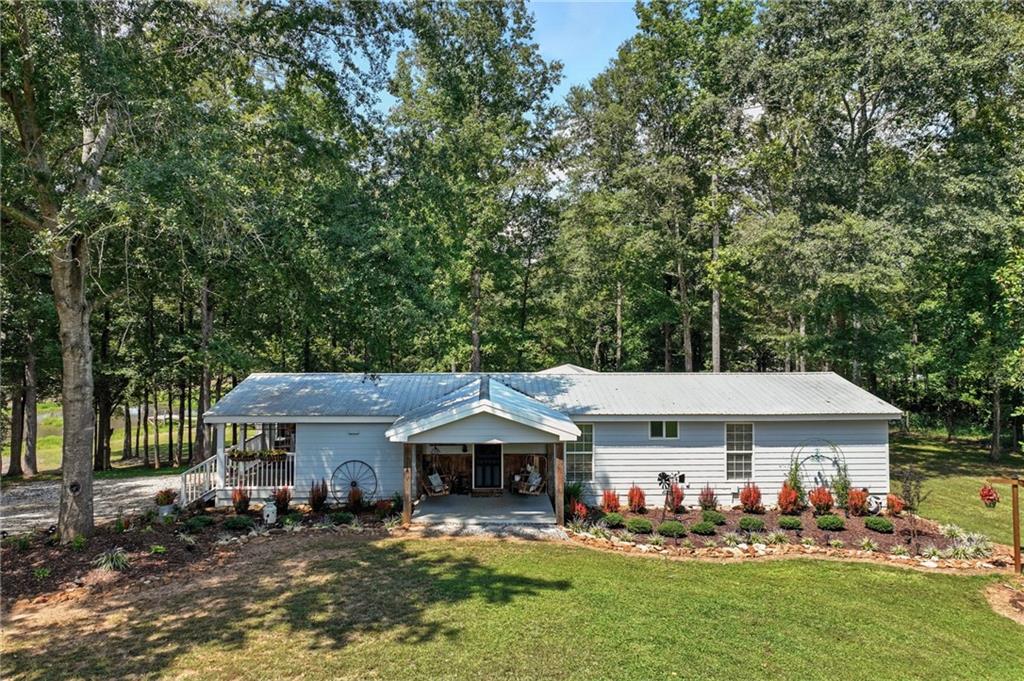 731 Borders Road Commerce, GA 30530 - Photo 49 of 75 a front view of a house with garden