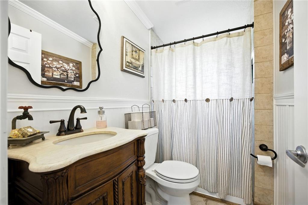 731 Borders Road Commerce, GA 30530 - Photo 65 of 75 a bathroom with a sink and a mirror