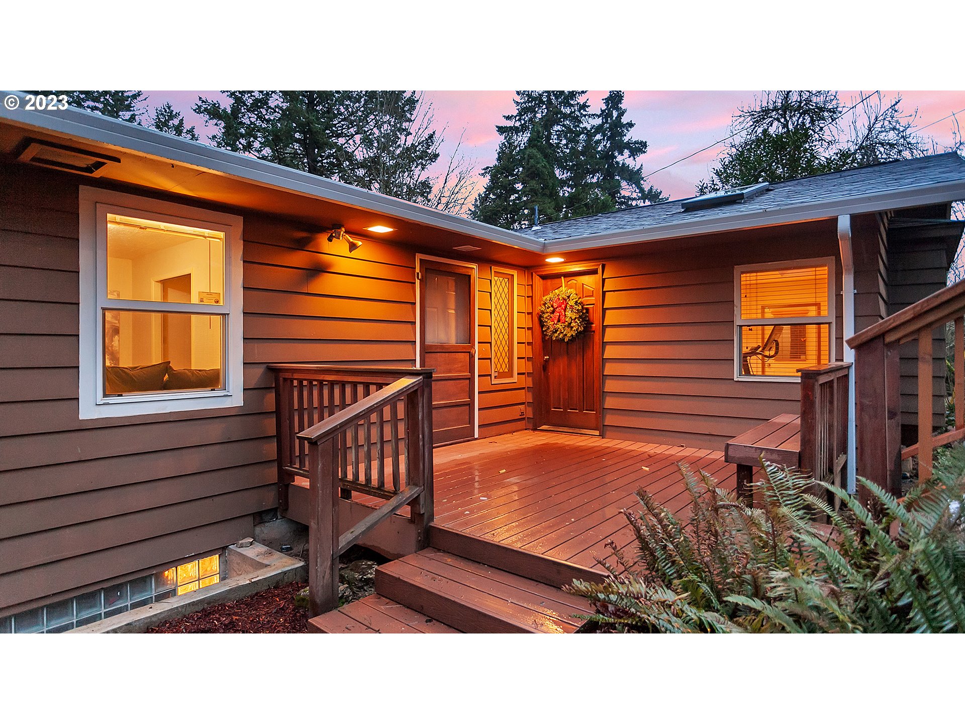 660 Southwest Maplecrest Drive Portland, OR 97219 - Photo 2 of 32 a backyard of a house with seating space