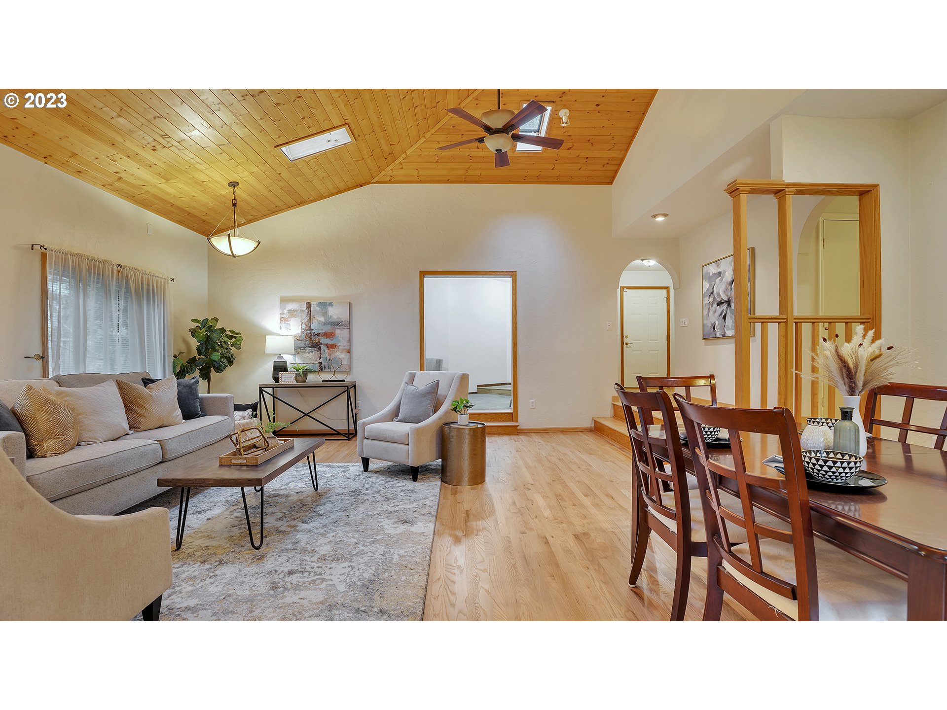 660 Southwest Maplecrest Drive Portland, OR 97219 - Photo 9 of 32 a living room with furniture and a flat screen tv