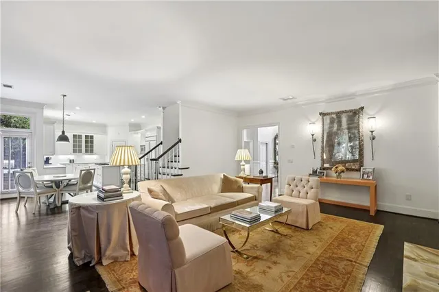 a living room with furniture or wooden floor and a table