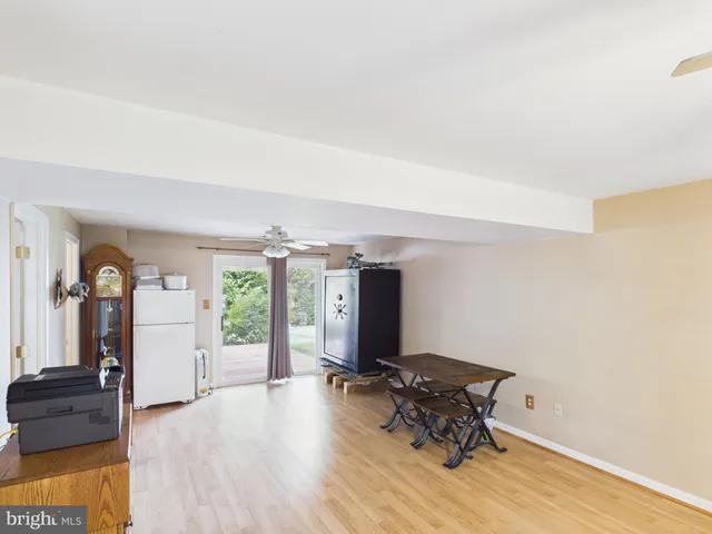 a room with furniture and wooden floor
