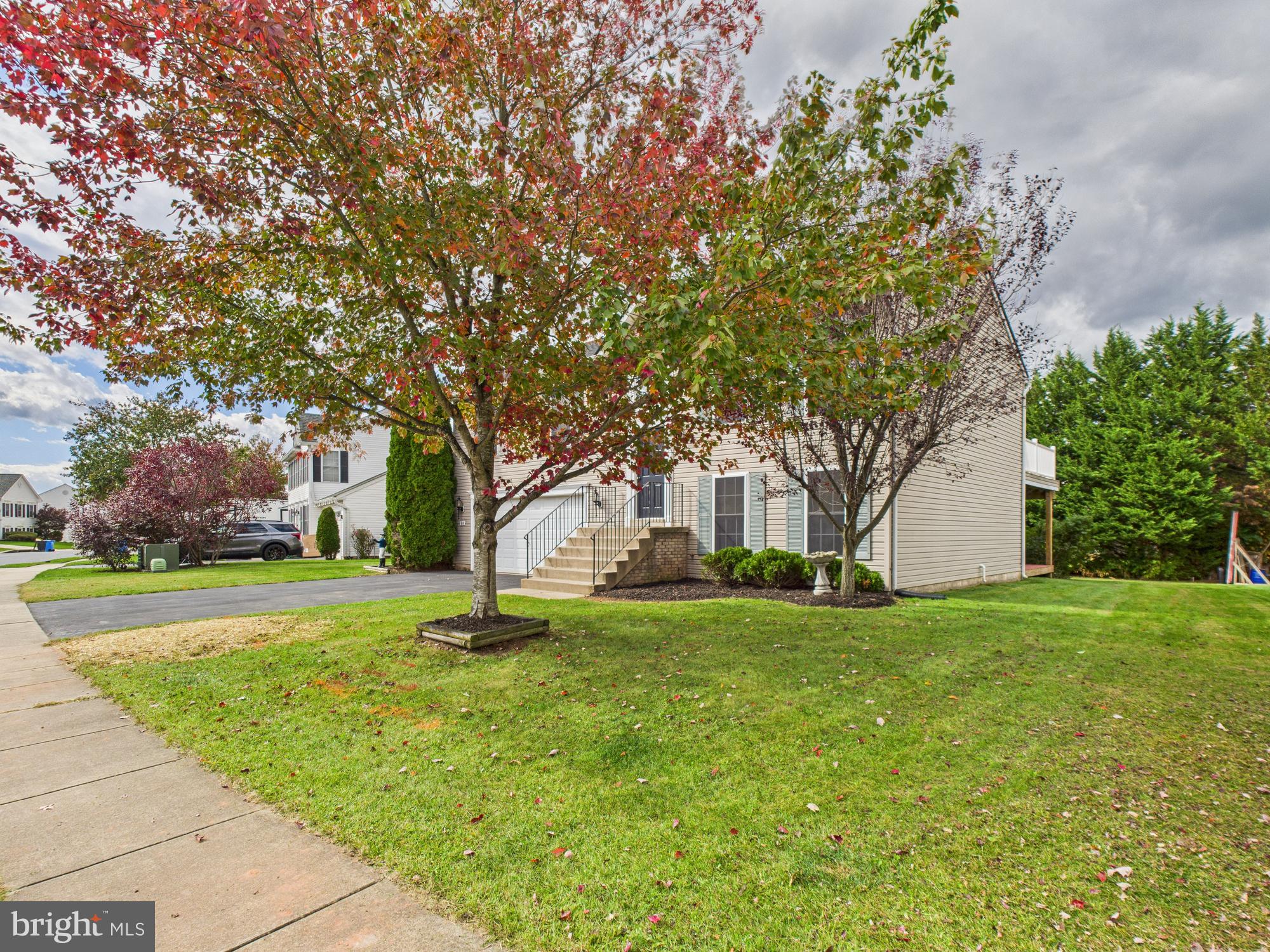 64 Bancroft Street Taneytown, MD 21787 - Photo 3 of 29 a building with trees in front of it