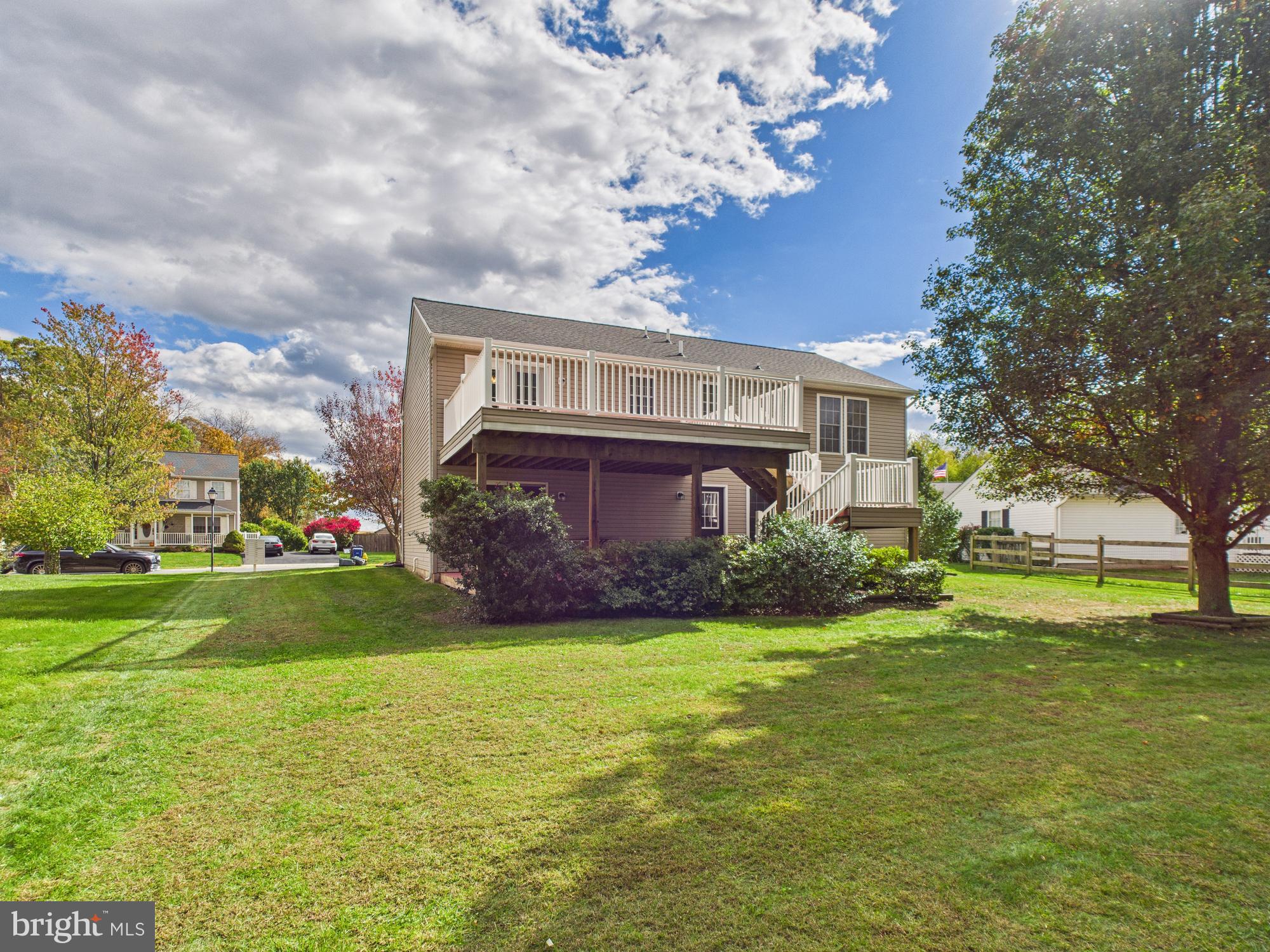 64 Bancroft Street Taneytown, MD 21787 - Photo 5 of 29 a view of a house with a yard