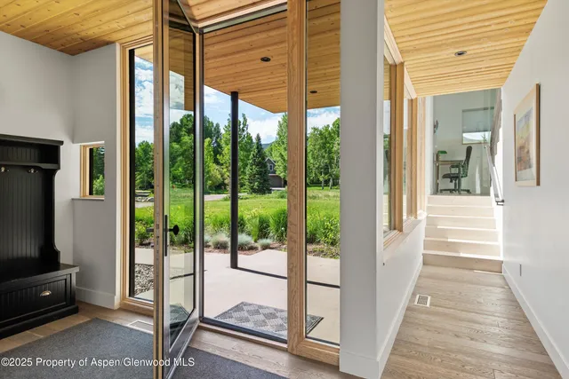 a view of a room with windows