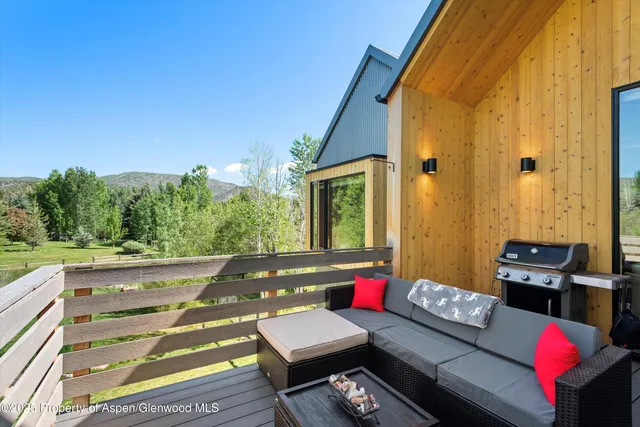 a building outdoor space with patio furniture