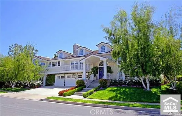 front view of a house with a small yard