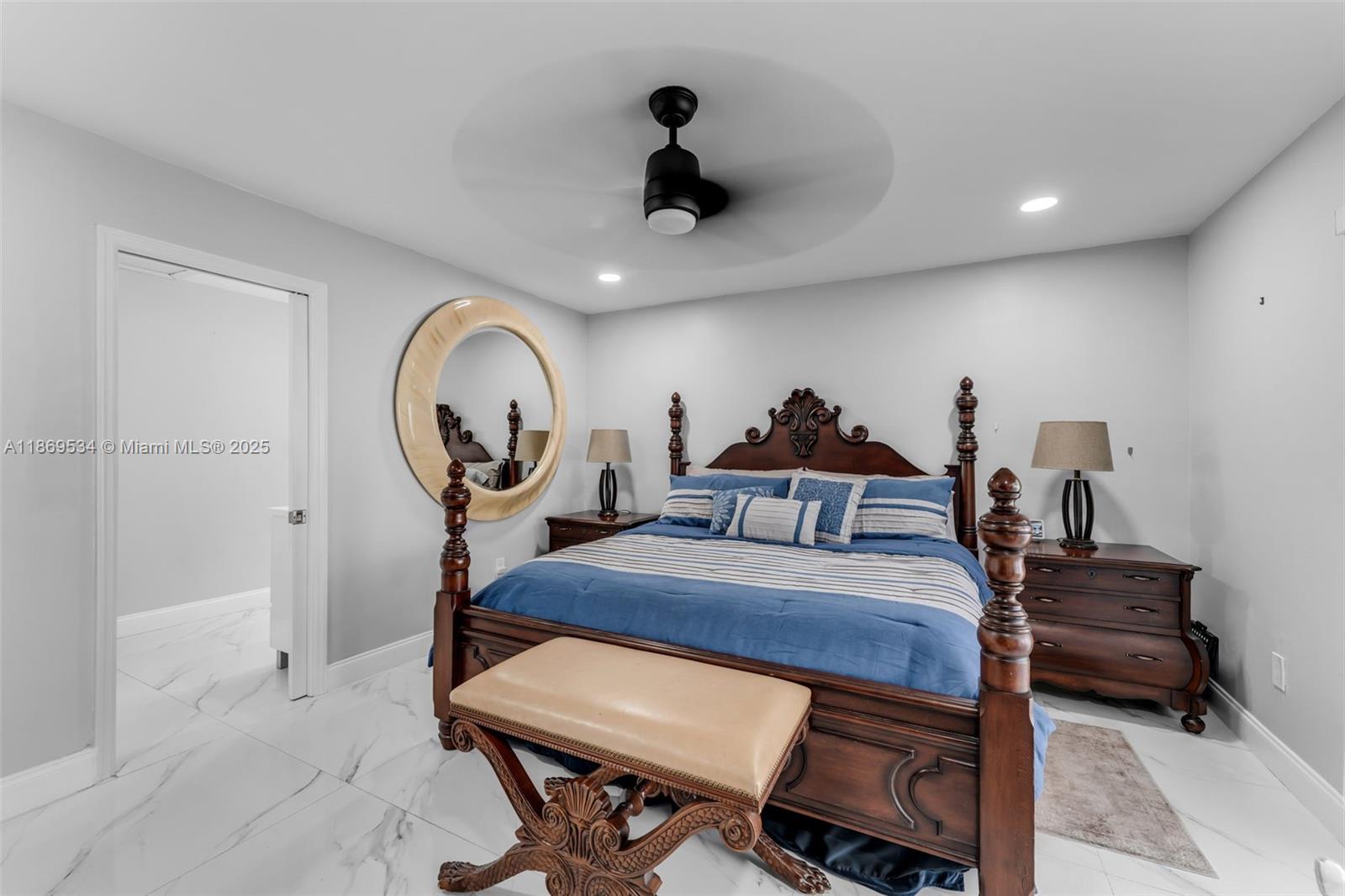 11186 Southwest 75th Terrace Miami, FL 33173 - Photo 11 of 26 a view of a dining room with furniture and a chandelier