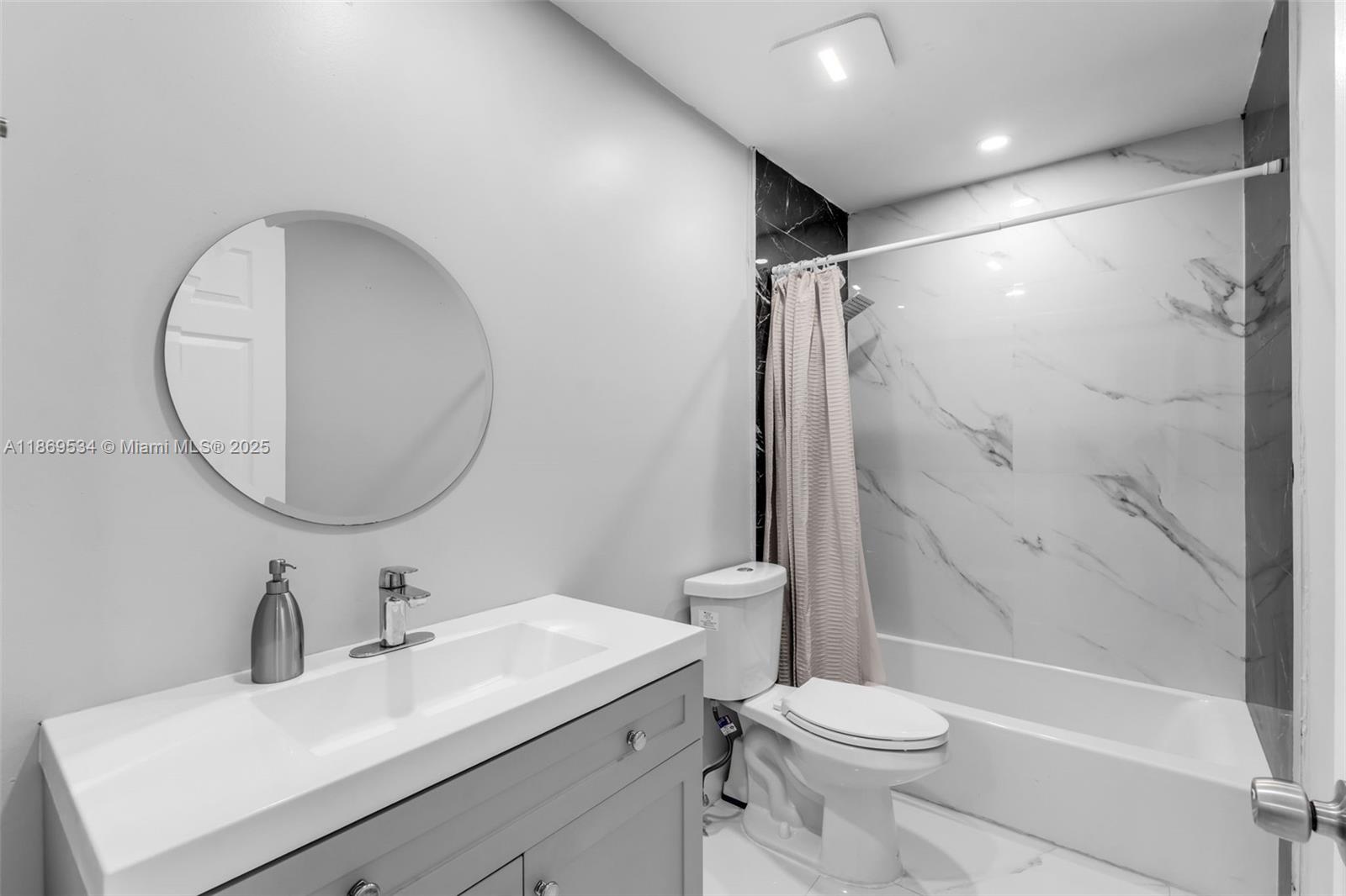 11186 Southwest 75th Terrace Miami, FL 33173 - Photo 15 of 26 a bathroom with a sink toilet and shower