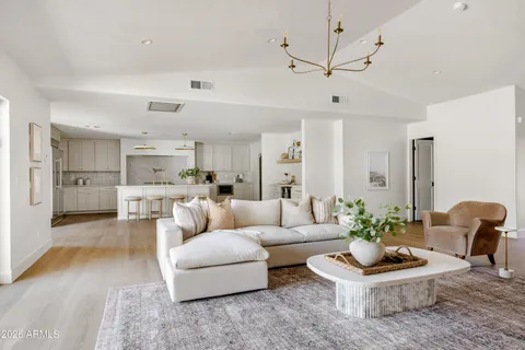 a kitchen with a sink cabinets and window