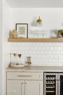 a view of a kitchen with washer and dryer
