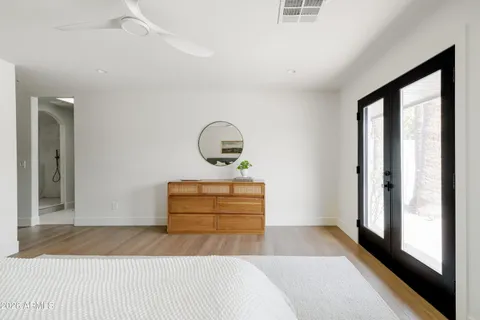 a white toilet sitting next to a bathroom sink
