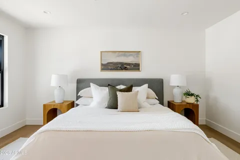 an aerial view of a house with a swimming pool