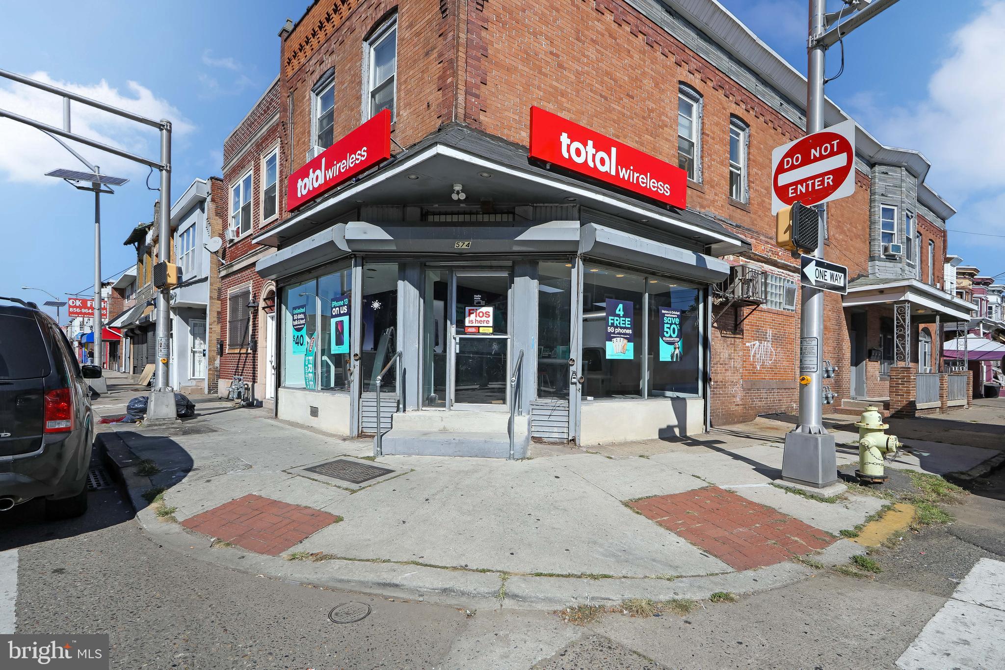 a view of a building with traffic signal lights