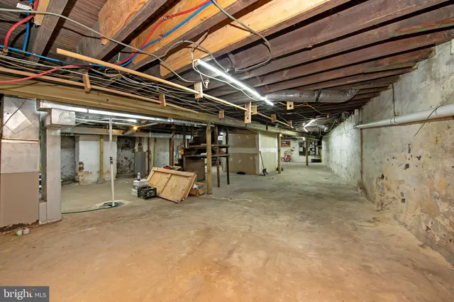 a view of a room with wooden walls
