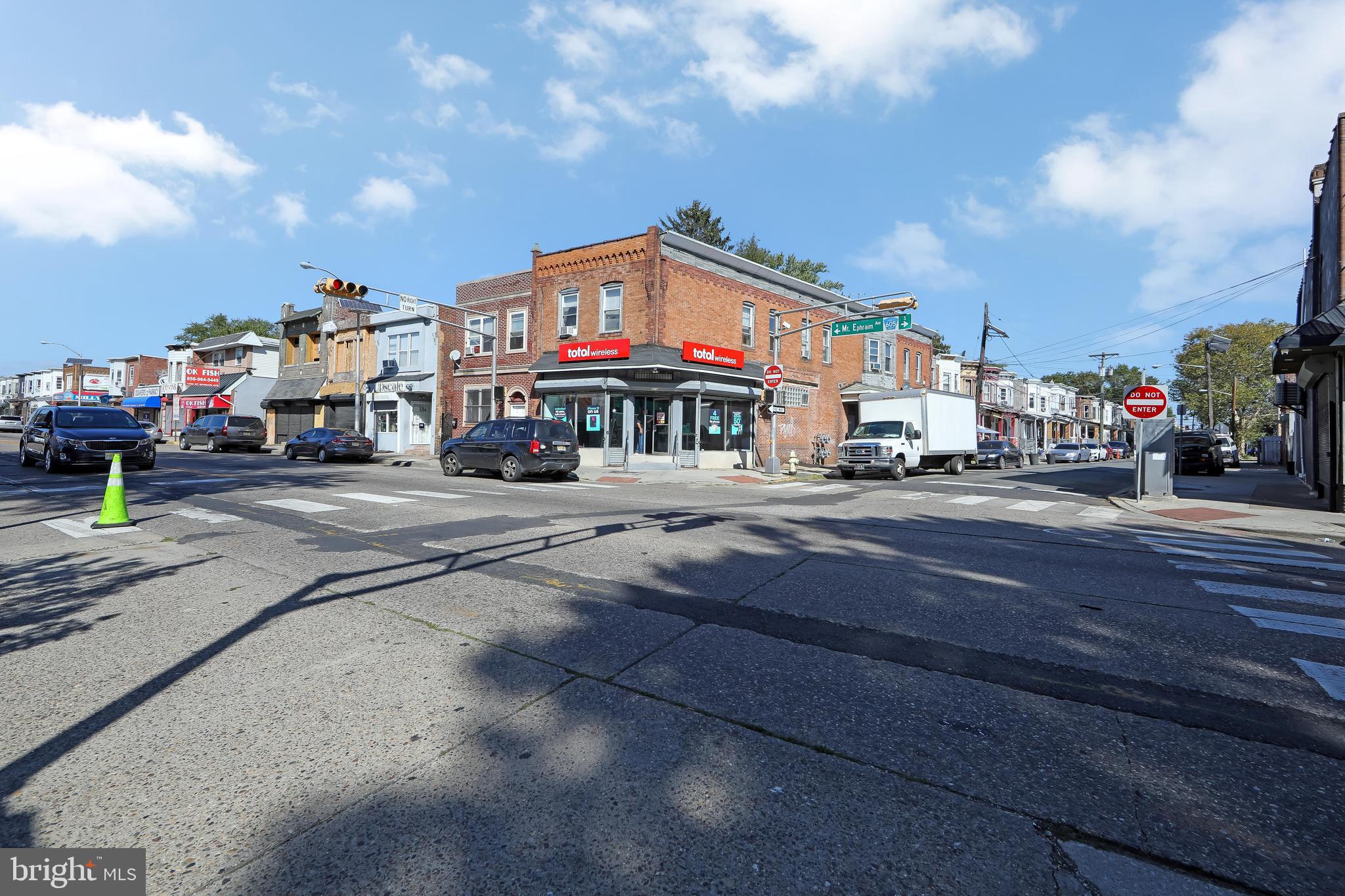 1574 Mt Ephraim Avenue Camden, NJ 08104 - Photo 18 of 54 a front view of a building with street