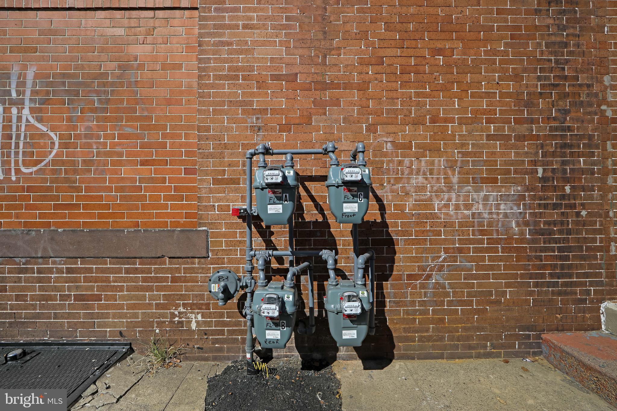 1574 Mt Ephraim Avenue Camden, NJ 08104 - Photo 20 of 54 a bathroom with a sink and a blue shower