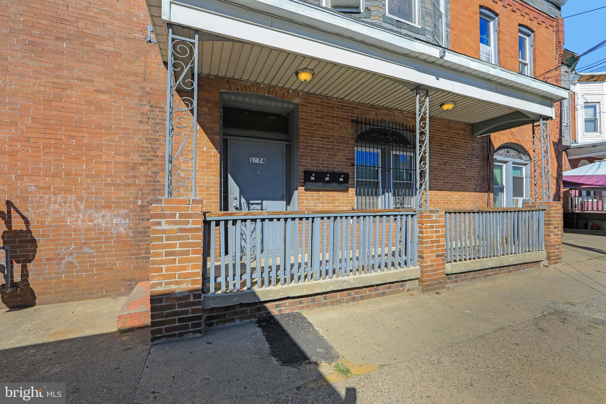 1574 Mt Ephraim Avenue Camden, NJ 08104 - Photo 21 of 54 a view of a house with a fence