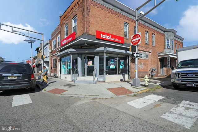 a view of a building with sitting area