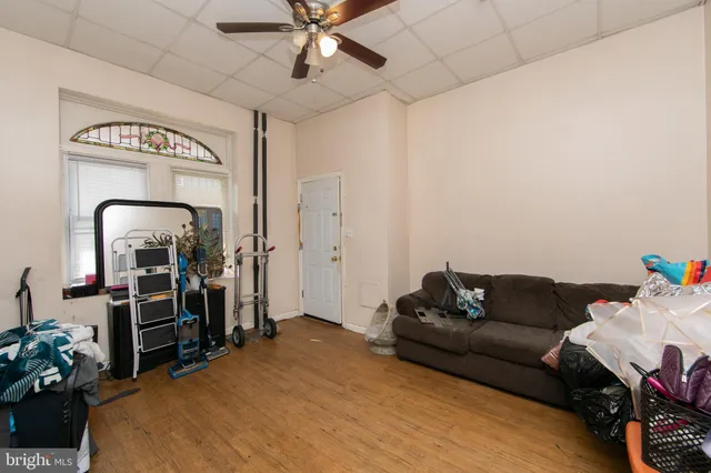 a kitchen with a cabinets and stove top oven