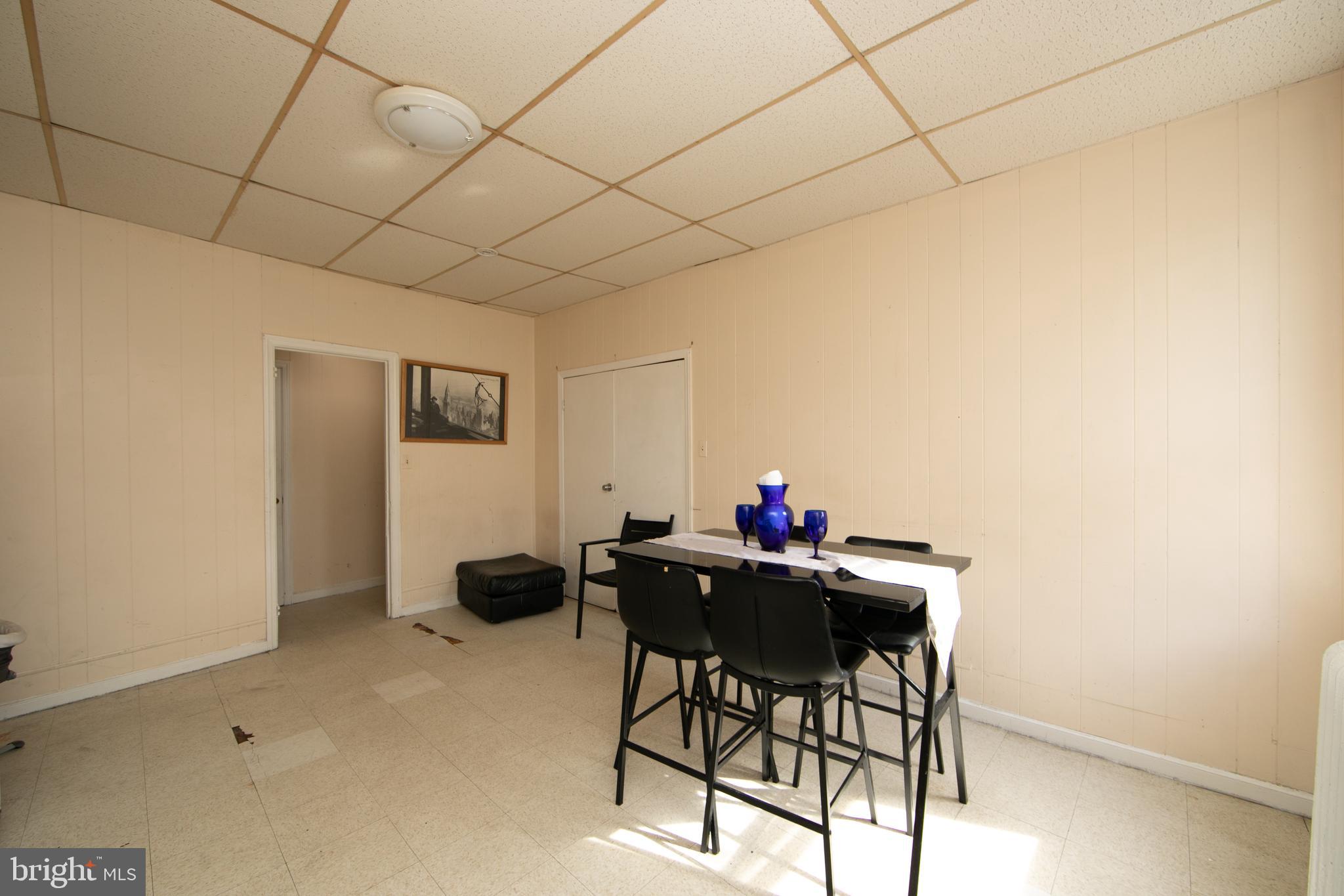 1574 Mt Ephraim Avenue Camden, NJ 08104 - Photo 50 of 54 a workspace with furniture and wooden floor