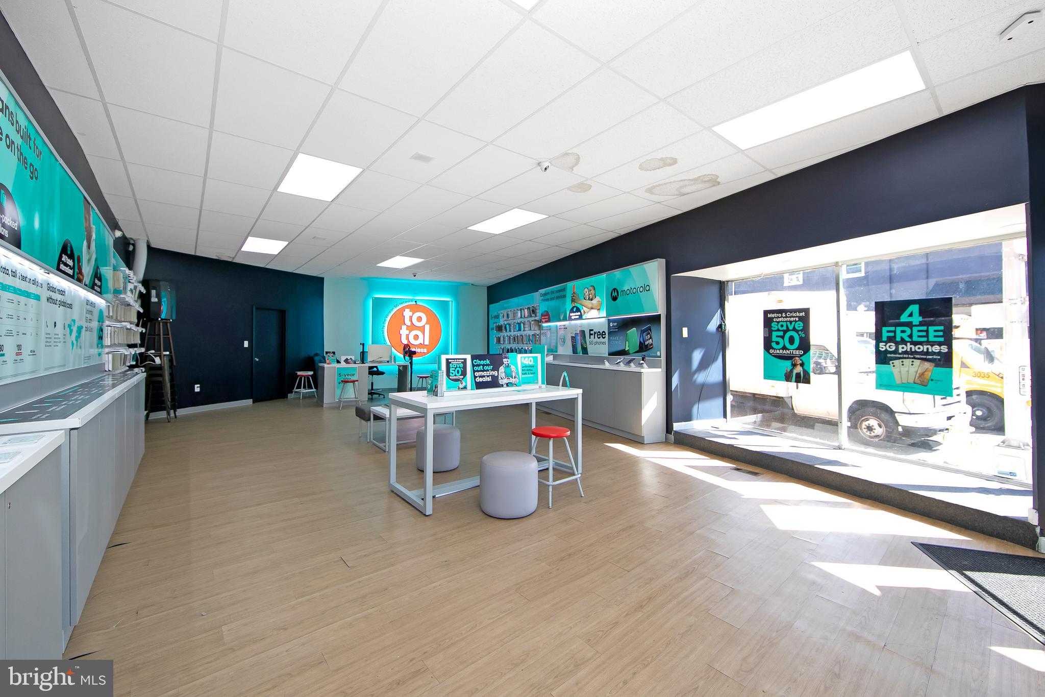 1574 Mt Ephraim Avenue Camden, NJ 08104 - Photo 5 of 54 a living room with furniture and a large window