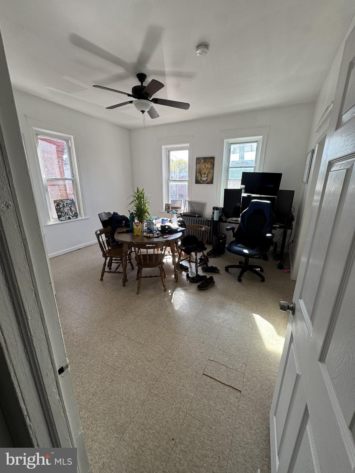 1574 Mt Ephraim Avenue Camden, NJ 08104 - Photo 51 of 54 a living room with furniture window and wooden floor