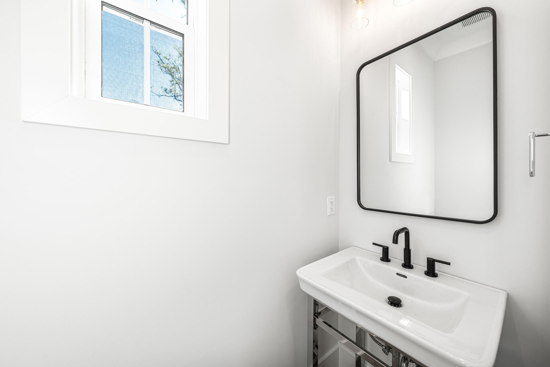 520 South County Highway 393, Unit 39B Santa Rosa Beach, FL 32459 - Photo 13 of 45 a bathroom with a sink and a mirror
